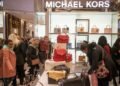What drove US' Capri Holdings' Q1 FY27 revenue decline?